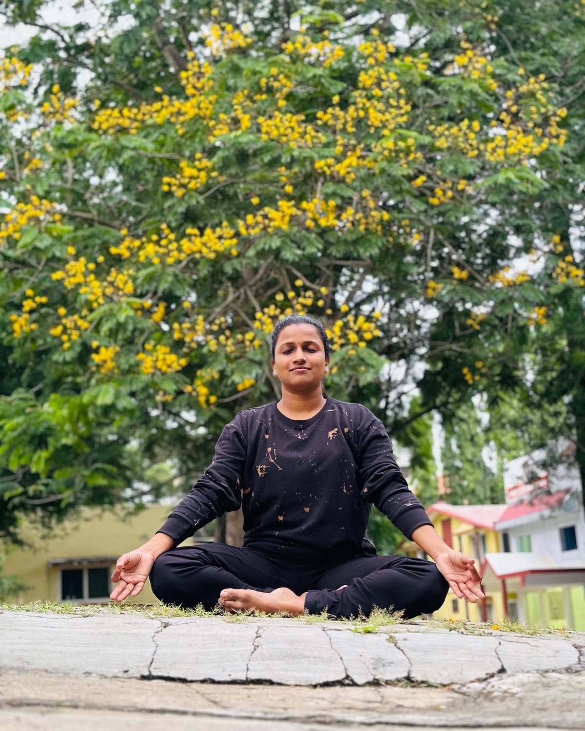 A yoga therapist from the VHG Thiruvananthapuram team in seated practice